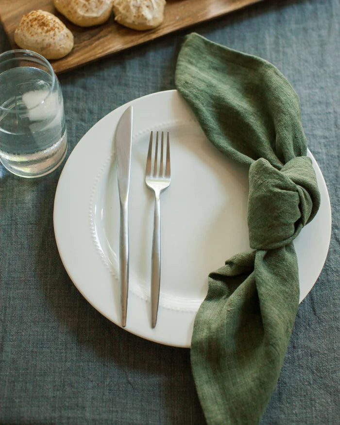 BelgianLoom Stone Washed Linen Napkins Sage-Belgian flax napkin paired with blue-toned table linens for layered texture